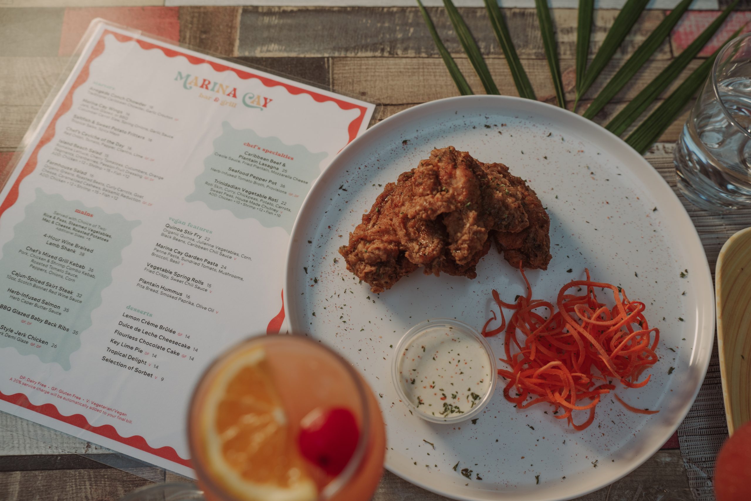 Marina Cay Menu Marina Cay menu and plate of chicken wings